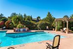 The pool has seating and loungers for warm Sedona days